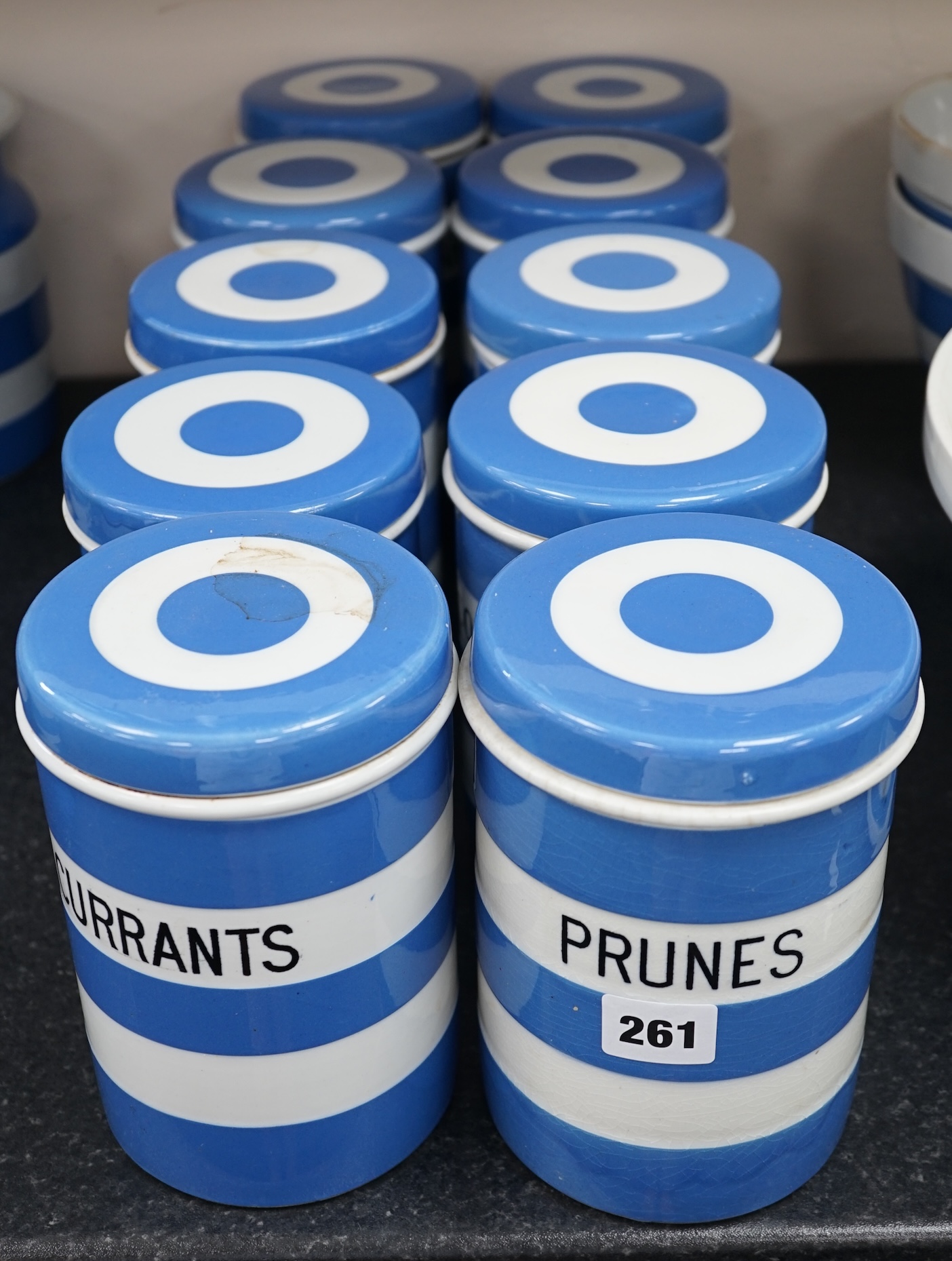 T.G.Green Cornish Kitchenware, ten 17.5cm lidded storage jars to include Prunes, Candied Peel, Loaf Sugar and Ground Rice, Green Church marks. Condition - fair to good